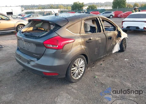 2018 Ford Focus Titanium z USA, uszkodzony, nr VIN 1FADP3N28JL294715
